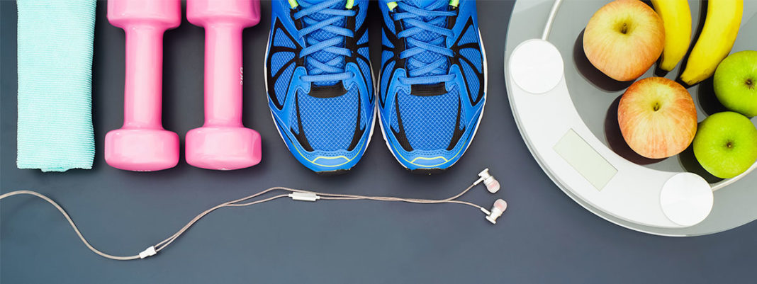 Exercise Weights, earphones, running sneakers, fruit, and scale