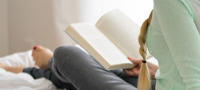 Female reading a book Female reading a book