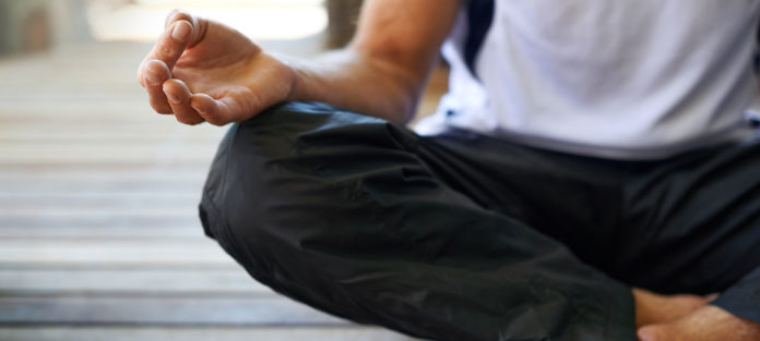 Close up of guy meditating