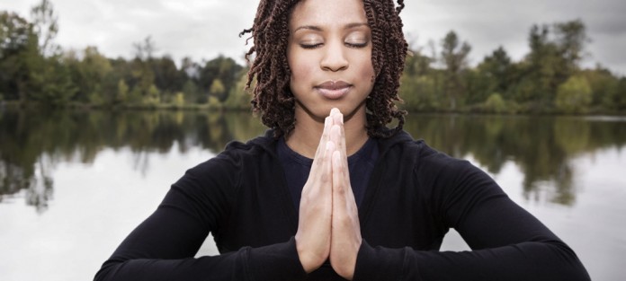 stress-less-this-holiday-season Female meditating