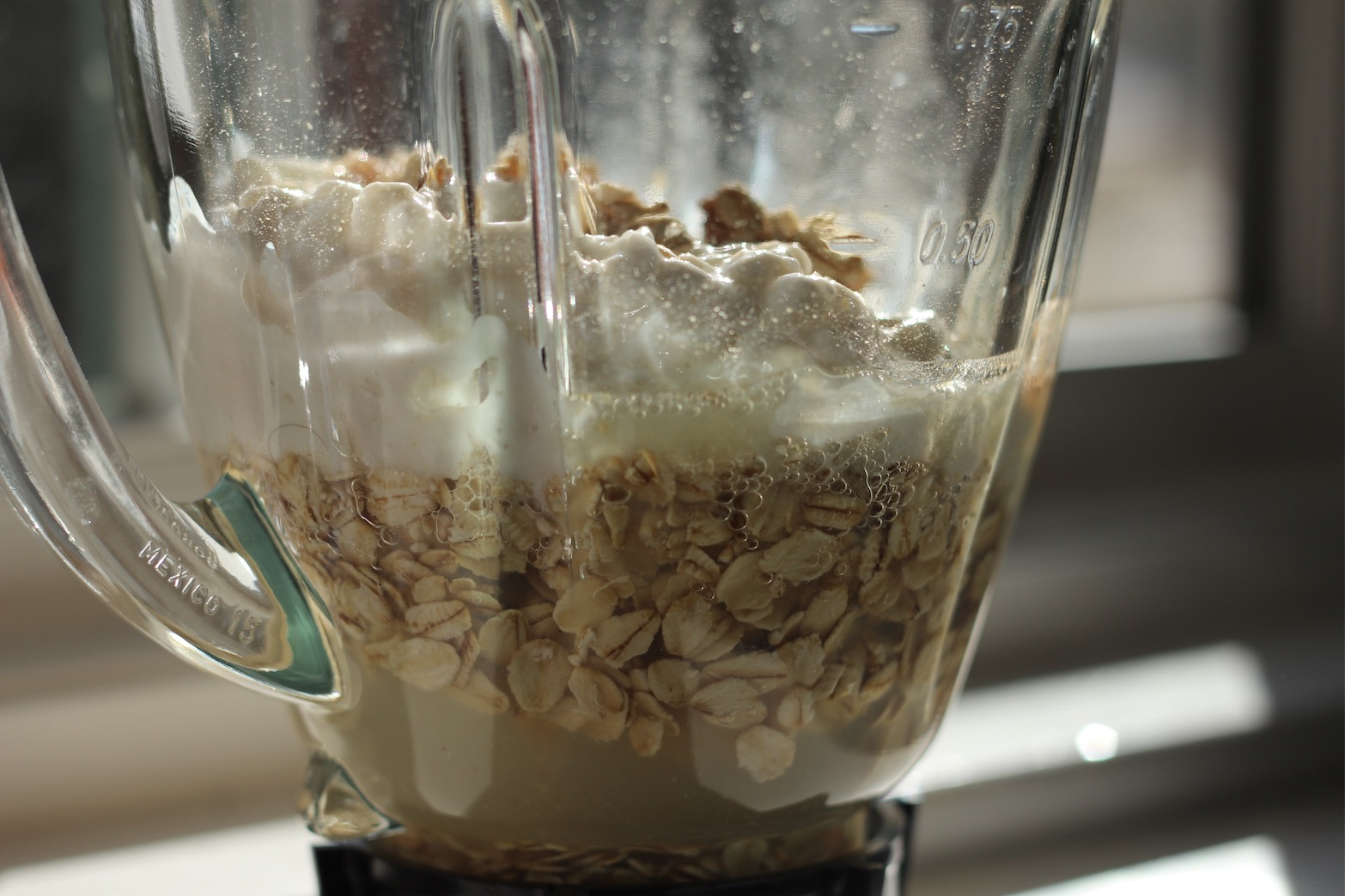 Place all of the ingredients (minus the toppings) into a blender