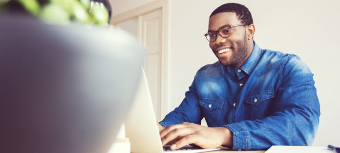Online student working on laptop