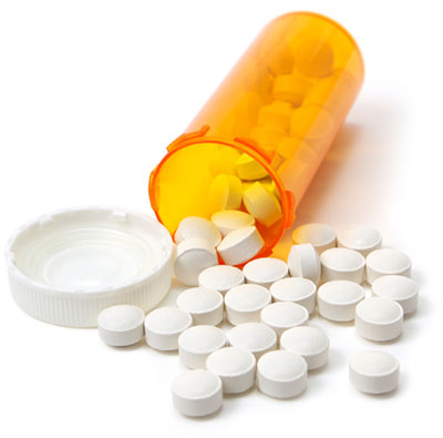 Bottle of open pills