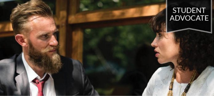 Student Advocate: Two adults having a serious conversation