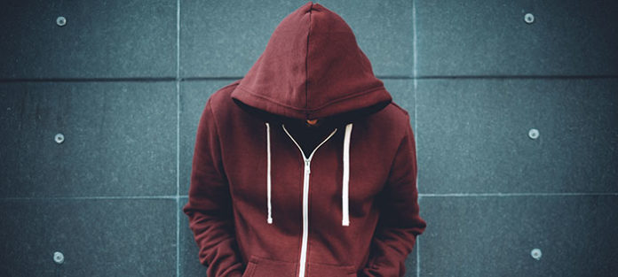 Guy with a hood over his face