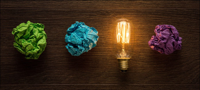 crumpled paper and light bulb