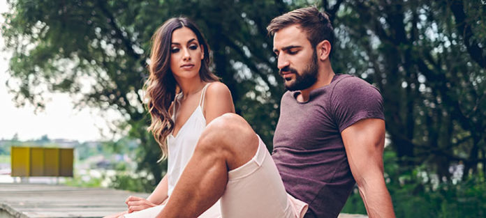 Guy and girl having serious conversation