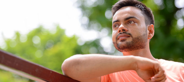 pensive indian male