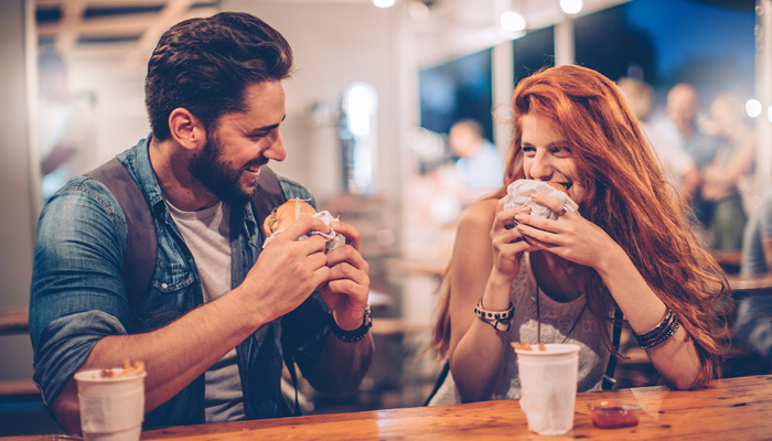 Heterosexual couple on casual dinner date