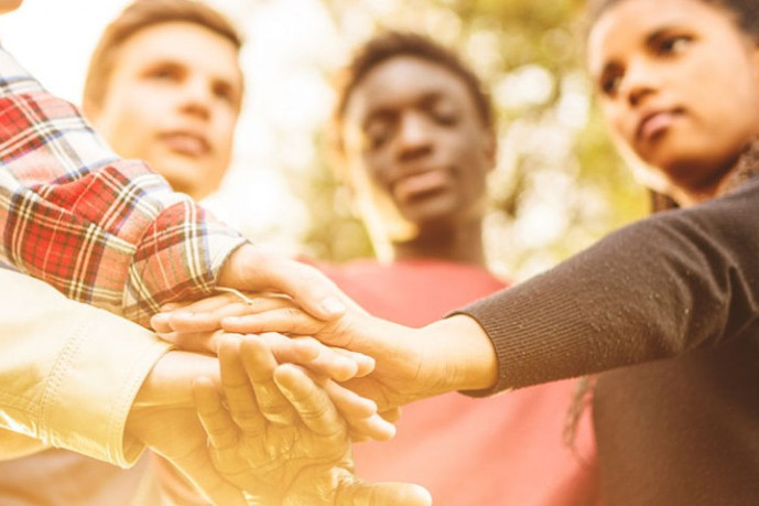 Students-diverse-hands-together1