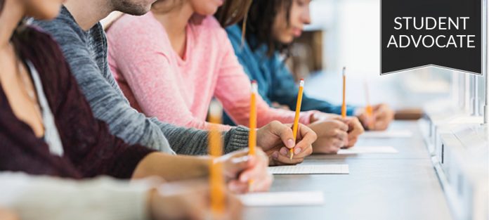 Student advocate: row of students taking a test