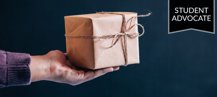 Student advocate: handing out gift box