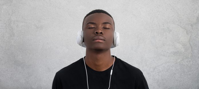 relaxed male with headphones