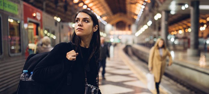 girl looking around the underground | study abroad tips