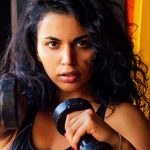 FitnessU: Cardio kickboxing workout for strength, balance, and coordination woman punching with dumbbells | cardio kickboxing workout