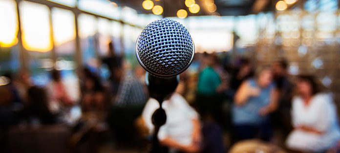 Microphone in front of a crowd