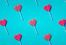 red heart lollipops on blue background | how to reignite the spark in a relationship
