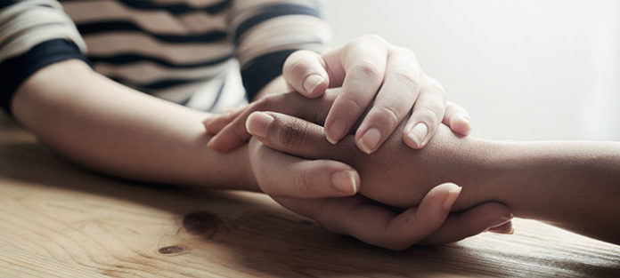 Hands holding