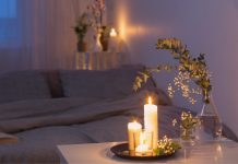 cozy bedroom with candles and eucalyptus | how to create a meditation space