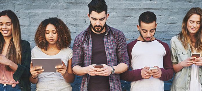 diverse group using devices