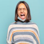 5 practical tips for managing anxiety young hispanic woman shouting | tips for managing anxiety
