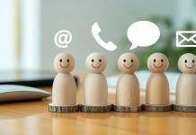 Speak like a pro: 5 communication hacks to boost your job hunt Wooden figurines with smiley faces on a desk, with icons for email, chat, and phone above them.