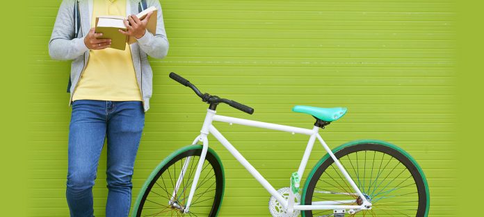 Student with bicycle