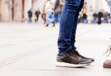 Closeup of shoes of two people facing each other