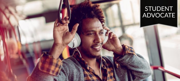 Student advocate: commuter enjoying bus ride with headphones