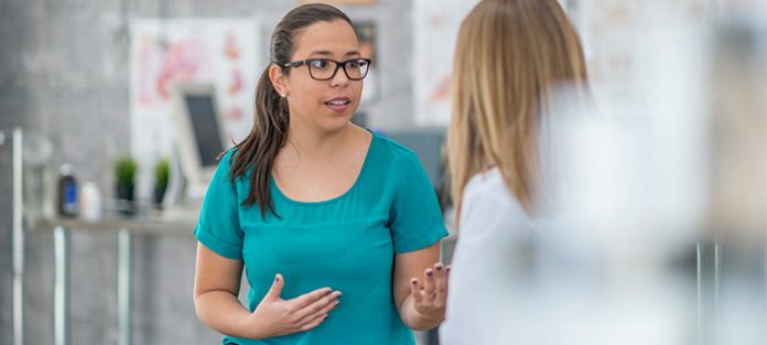 female patient and doctor discussing lump in breast