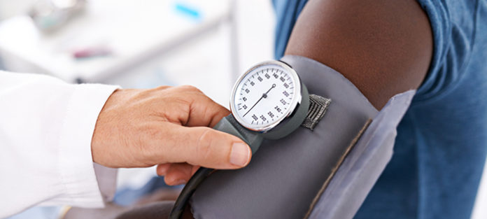 Patient receiving blood pressure check