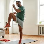 FitnessU: A quiet, low-impact HIIT routine for shared spaces man exercising at home | low impact hiit