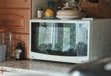 5 easy meals for when you don’t have time to cook Image of a kitchen countertop with a microwave, kettle, and various kitchen items neatly arranged.