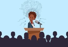 Illustration of nervous speaker at podium with anxious thoughts, facing a large seated audience.