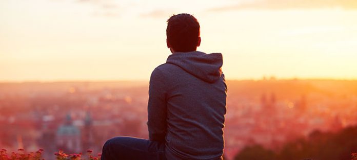 guy watching a sunset