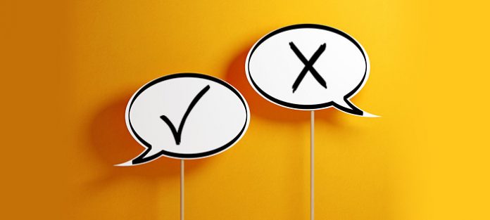 white chat bubbles including checkmark and x
