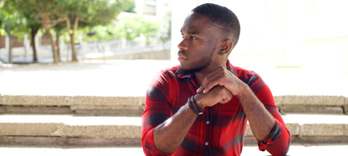 pensive young black man