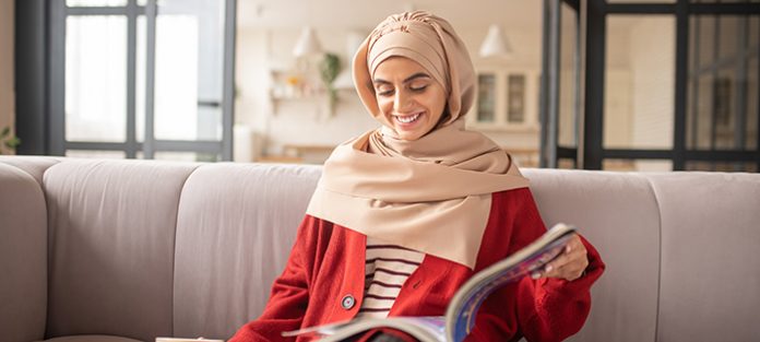 Smart girl feeling relaxed while learning English Smart girl feeling relaxed while learning English